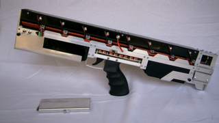 Watch a Fully Automatic Electromagnetic Pulse Rifle Demolish a Laptop